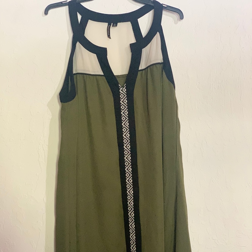 Green with black strip through the front middle